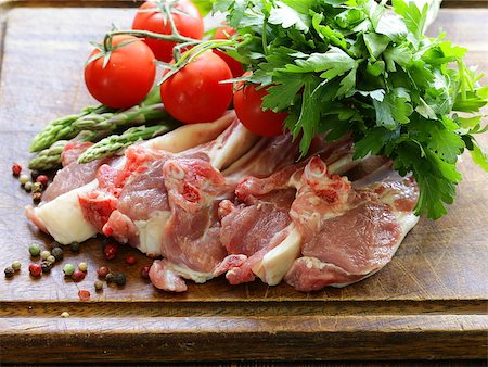 raw meat, lamb chops with vegetables on wooden board Stock Photo - Budget Royalty-Free & Subscription, Code: 400-07630885