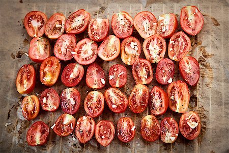 dehydrated - Vegetarian food. Sun dried tomatoes with herbs and garlic. Italian food vegetables Stock Photo - Budget Royalty-Free & Subscription, Code: 400-07631800