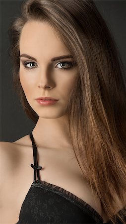 simsearch:400-06428713,k - Beautiful, young, sensual woman with long, straight, brown hair, dark make up, wearing sexy, balck lingerie. Stock Photo - Budget Royalty-Free & Subscription, Code: 400-07633855