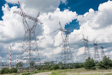 Pylon and transmission power line in summer day Stock Photo - Budget Royalty-Free & Subscription, Code: 400-07658281