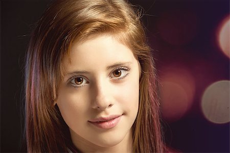 simsearch:400-07509444,k - Studio fashion portrait of young beautiful girl with nice eyes on dark red background Stock Photo - Budget Royalty-Free & Subscription, Code: 400-07660113