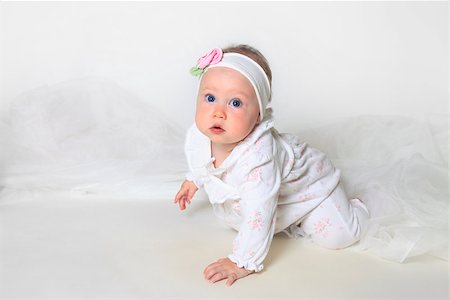 simsearch:400-05153083,k - Beautiful small kid girl in studio Stock Photo - Budget Royalty-Free & Subscription, Code: 400-07675777