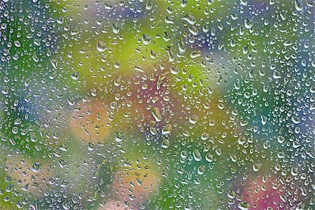 rainy day sad - Rain drops on a window. Abstraction Stock Photo - Budget Royalty-Free & Subscription, Code: 400-07677565