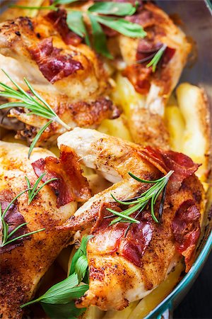 simsearch:400-06079651,k - Tasty baked chicken with potatoes and herbs Stock Photo - Budget Royalty-Free & Subscription, Code: 400-07678574