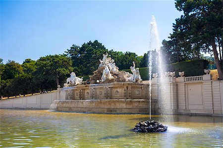 simsearch:400-07681663,k - AUSTRIA, VIENNA - AUGUST 4,2013: View on Gloriette and Neptune fountain in Schonbrunn Palace, Vienna, Austria Stock Photo - Budget Royalty-Free & Subscription, Code: 400-07678610