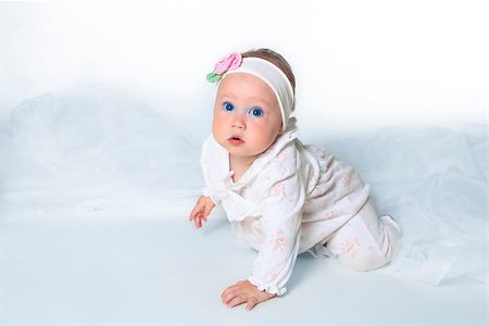 simsearch:400-05153083,k - Beautiful small kid girl in studio Stock Photo - Budget Royalty-Free & Subscription, Code: 400-07679812