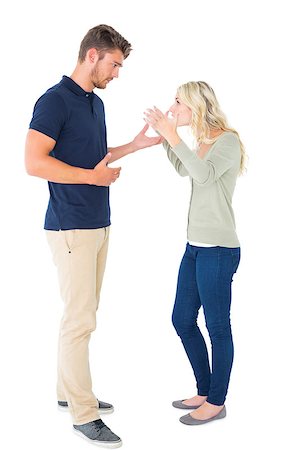 Young couple having an argument on white background Stock Photo - Budget Royalty-Free & Subscription, Code: 400-07686655