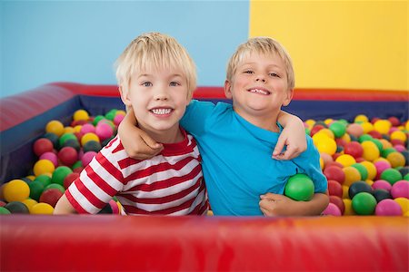 Happy children playing in ball pool at a party Stock Photo - Budget Royalty-Free & Subscription, Code: 400-07689268