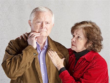 elder care - Worried wife holding concerned husband in jacket Stock Photo - Budget Royalty-Free & Subscription, Code: 400-07680717