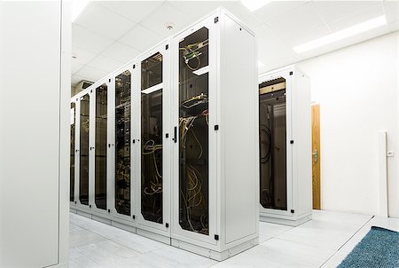 Racks with network equipment in technology telehouse room Stock Photo - Budget Royalty-Free & Subscription, Code: 400-07682265