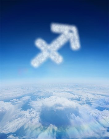 sagittarius - Cloud in shape of sagittarius star sign against blue sky over clouds at high altitude Stock Photo - Budget Royalty-Free & Subscription, Code: 400-07682998