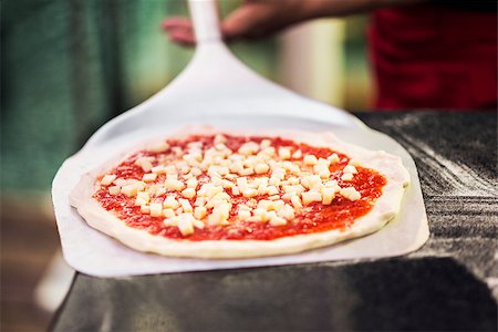 italian margarita pizza ready for the oven Stock Photo - Budget Royalty-Free & Subscription, Code: 400-07715150