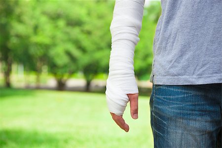 closeup of bandaged arm  with park background Stock Photo - Budget Royalty-Free & Subscription, Code: 400-07716020