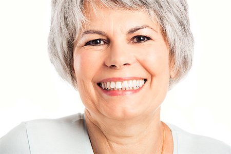 simsearch:400-07221782,k - Portrait of a senior woman smiling, isolated on white Stock Photo - Budget Royalty-Free & Subscription, Code: 400-07718371