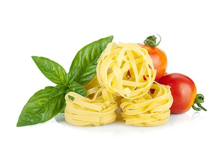 simsearch:400-06796273,k - Italian colors food. Basil, pasta and tomatoes. Isolated on white background Stock Photo - Budget Royalty-Free & Subscription, Code: 400-07719019