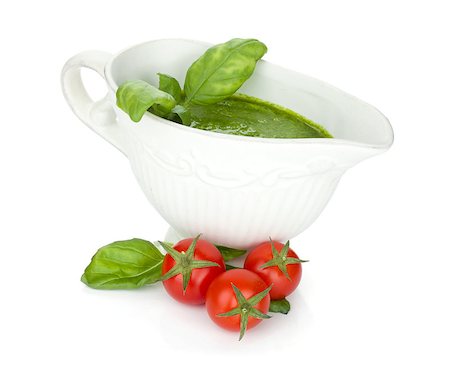 simsearch:400-06796273,k - Pesto sauce and cherry tomatoes. Isolated on white background Stock Photo - Budget Royalty-Free & Subscription, Code: 400-07719175