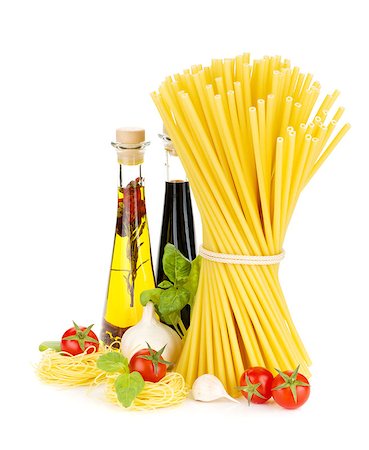 simsearch:400-06796273,k - Pasta, tomatoes, basil, olive oil, vinegar, garlic and parmesan cheese. Isolated on white background Stock Photo - Budget Royalty-Free & Subscription, Code: 400-07719173