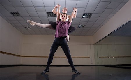 simsearch:400-07725556,k - Ballet partners dancing gracefully together in the ballet studio Stock Photo - Budget Royalty-Free & Subscription, Code: 400-07725595