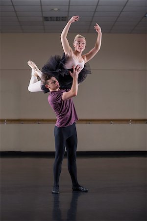 simsearch:400-07725556,k - Ballet partners dancing gracefully together in the ballet studio Stock Photo - Budget Royalty-Free & Subscription, Code: 400-07725596