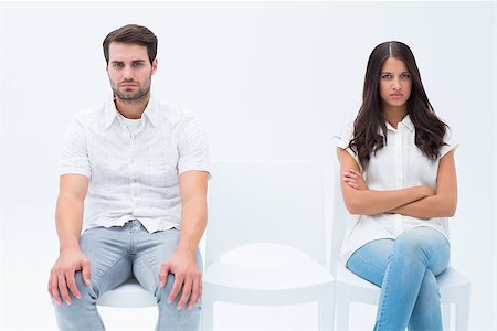 Angry couple not talking after argument on white background Stock Photo - Budget Royalty-Free & Subscription, Code: 400-07726739