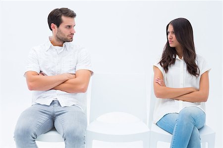 Angry couple not talking after argument on white background Stock Photo - Budget Royalty-Free & Subscription, Code: 400-07726740