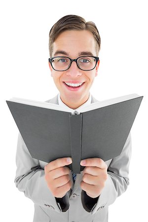 Geeky preacher reading from black bible on white background Stock Photo - Budget Royalty-Free & Subscription, Code: 400-07727159