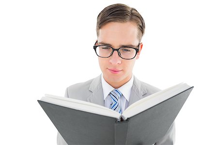 Geeky preacher reading from black bible on white background Stock Photo - Budget Royalty-Free & Subscription, Code: 400-07727160