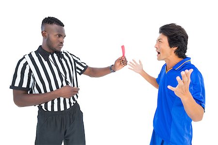 referee (male) - Serious referee showing red card to player on white background Stock Photo - Budget Royalty-Free & Subscription, Code: 400-07721752