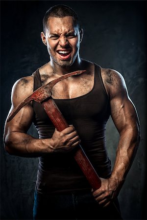 Muscular man holding pickaxe Stock Photo - Budget Royalty-Free & Subscription, Code: 400-07747015