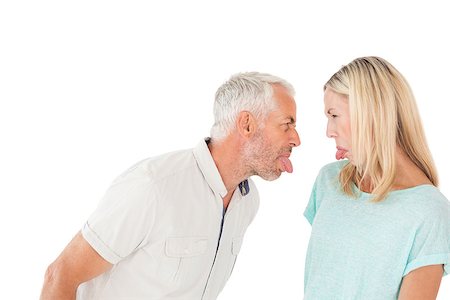 Mature couple arguing with each other over white background Stock Photo - Budget Royalty-Free & Subscription, Code: 400-07750736