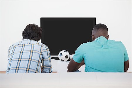 simsearch:628-05817772,k - Rear view of two soccer fans watching tv Stock Photo - Budget Royalty-Free & Subscription, Code: 400-07750805