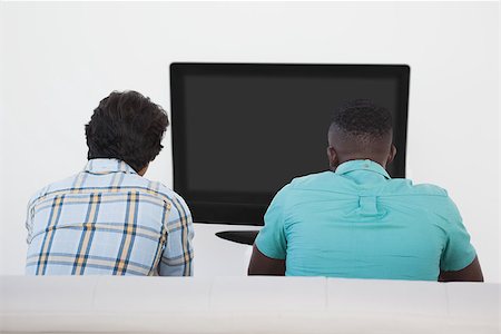 simsearch:628-05817772,k - Rear view of two soccer fans watching tv Stock Photo - Budget Royalty-Free & Subscription, Code: 400-07750801