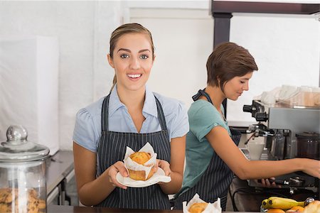 simsearch:400-07750853,k - Pretty waitresses working with a smile at the coffee shop Stock Photo - Budget Royalty-Free & Subscription, Code: 400-07750919