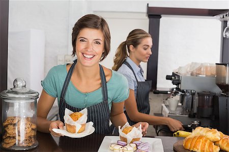 simsearch:400-07750853,k - Pretty waitresses working with a smile at the coffee shop Stock Photo - Budget Royalty-Free & Subscription, Code: 400-07750920