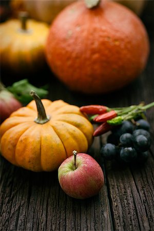 pumpkin fruit and his leafs - Autumn table setting with pumpkins.  Thanksgiving dinner and autumn decoration. Stock Photo - Budget Royalty-Free & Subscription, Code: 400-07794939
