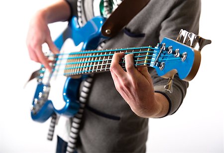 picture of the blue playing a instruments - Man playing a guitar Stock Photo - Budget Royalty-Free & Subscription, Code: 400-07792002