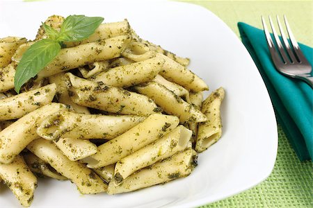 pasta with pesto sauce on white dish Stock Photo - Budget Royalty-Free & Subscription, Code: 400-07792119