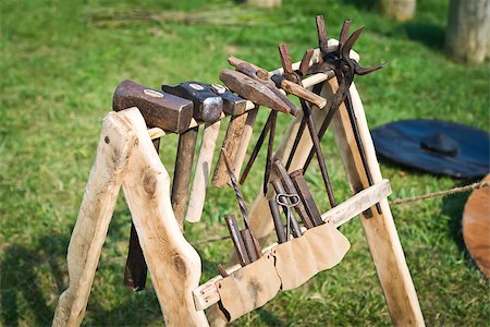 simsearch:400-06560568,k - Old wooden rack with blacksmith's tool Photographie de stock - Aubaine LD & Abonnement, Code: 400-07818823