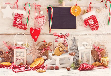 simsearch:400-05693036,k - Christmas decorations with cookies in a glass bell jar on a sledge with place for greeting on chalk blackboard. Toned photo. Stock Photo - Budget Royalty-Free & Subscription, Code: 400-07824826