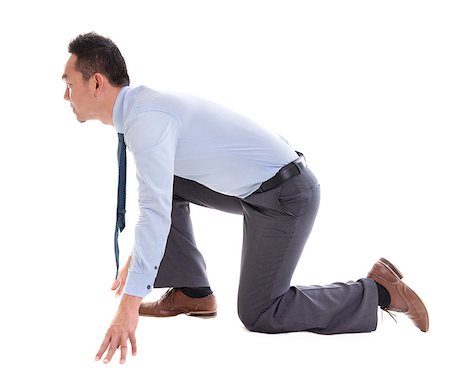 Asian business man on starting line of a race, side view full length isolated over white background. Stock Photo - Budget Royalty-Free & Subscription, Code: 400-07825028