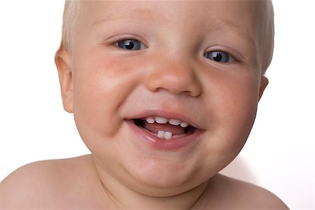 One year old boy with milk teeths smiling Stock Photo - Budget Royalty-Free & Subscription, Code: 400-07829251