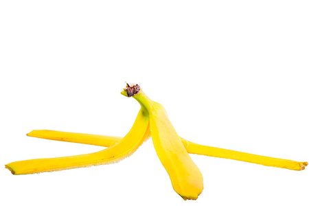 photos of vegetable garbage - empty skin of a banana on white background Stock Photo - Budget Royalty-Free & Subscription, Code: 400-07820604