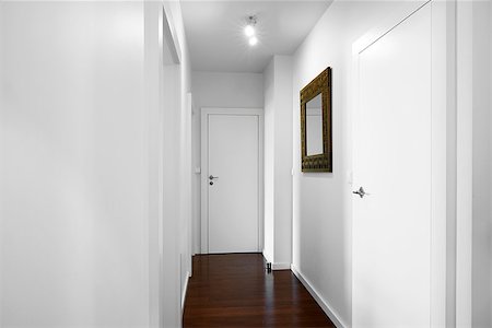simsearch:600-06808788,k - Empty home hall with walls and doors in white colors. Can be used as a background. Photographie de stock - Aubaine LD & Abonnement, Code: 400-07821090