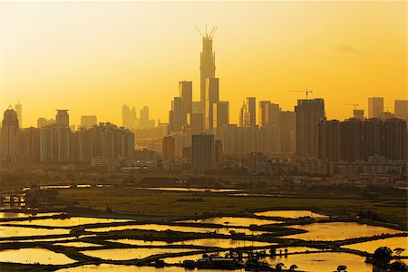 simsearch:400-07171274,k - Air pollution scenic in countryside with building, rice field and yellow smoke in hong kong city at sunset Stock Photo - Budget Royalty-Free & Subscription, Code: 400-07821252