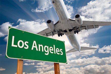 Los Angeles Green Road Sign and Airplane Above with Dramatic Blue Sky and Clouds. Photographie de stock - Aubaine LD & Abonnement, Code: 400-07821904