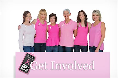simsearch:400-07835111,k - Smiling women posing with pink tops for breast cancer awareness against pink card Stock Photo - Budget Royalty-Free & Subscription, Code: 400-07834851