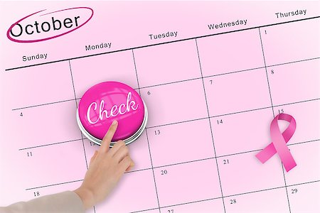 simsearch:400-07834847,k - Hand pushing pink button for breast cancer awareness on october calendar Stock Photo - Budget Royalty-Free & Subscription, Code: 400-07834869