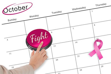 simsearch:400-07834847,k - Hand pushing pink button for breast cancer awareness on october calendar Stock Photo - Budget Royalty-Free & Subscription, Code: 400-07834875