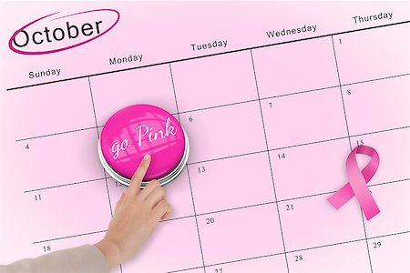 simsearch:400-07834847,k - Hand pushing pink button for breast cancer awareness on october calendar Stock Photo - Budget Royalty-Free & Subscription, Code: 400-07834872