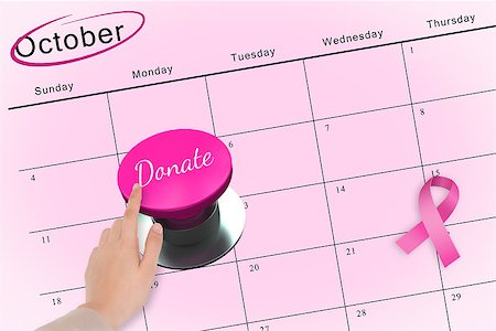 simsearch:400-07834847,k - Hand pushing pink button for breast cancer awareness on october calendar Stock Photo - Budget Royalty-Free & Subscription, Code: 400-07834883